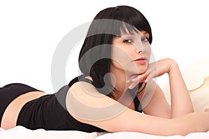 Sensual woman lying in the bed
