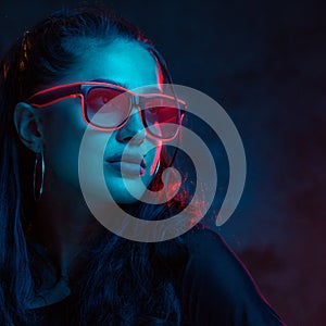 Sensual woman in neon glasses portrait