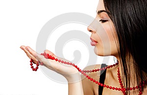 Sensual woman and red pearl necklace