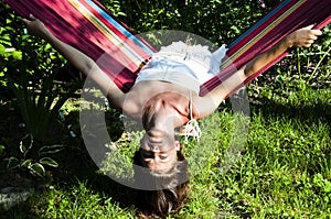 Sensual woman relax on hammock. sexy girl relaxing on hammock. summer rest and activity. summer vacation. Young woman is resting