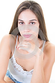 Sensual woman touching her face in natural beauty and skincare concept isolated over white background