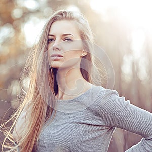 Sensual young blonde woman portrait outdoor fashion portrait