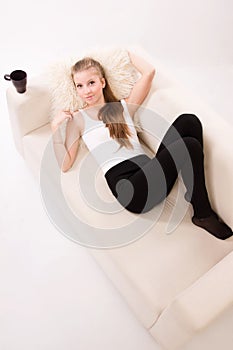 Sensuality woman lying on a sofa