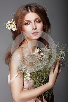 Sentiment. Portrait of Redhair Nostalgic Woman with Herbs