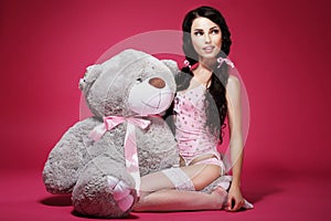 Sentiment. Valentine. Young Woman with Soft Toy Sitting. Sensuality