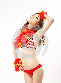 Sentimentality. Relax. Asian woman in Red Swimming Suit in Reverie. Origami Flowers