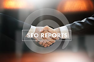 SEO REPORTS Concept Business team hands at work with financial r