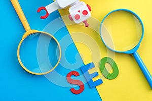 SEO Search engine optimization concept with blue and yellow magn