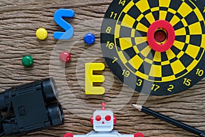 SEO search engine optimization concept with pencil, dartboard, m
