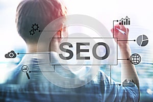 SEO - Search engine optimization, Digital marketing and internet technology concept on blurred background