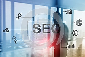 SEO - Search engine optimization, Digital marketing and internet technology concept on blurred background