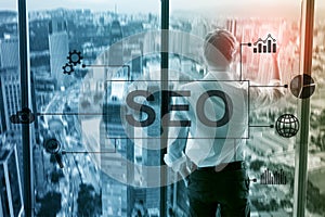 SEO - Search engine optimization, Digital marketing and internet technology concept on blurred background