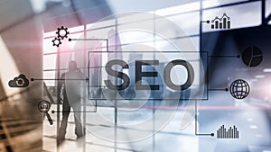 SEO - Search engine optimization, Digital marketing and internet technology concept on blurred background