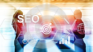 SEO - Search engine optimization, Digital marketing and internet technology concept on blurred background.