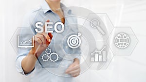 SEO - Search engine optimization, Digital marketing and internet technology concept on blurred background.