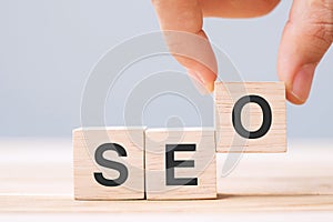 SEO Search Engine Optimization text wooden cube blocks on table background. Idea, Strategy, marketing, Keyword and Content