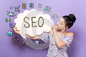 SEO with woman holding a speech bubble