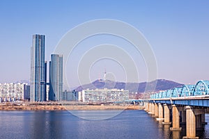 Seoul city and N Seoul Tower, or Namsan Tower, blue skies above Seoul, South Korea