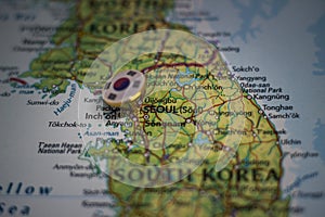 Seoul pinned on a map with the flag of South Korea