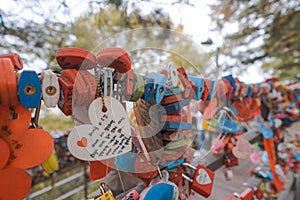 Seoul, South Korea - October 25, 2019 : Heart-shaped eubber key chains and square metal padlocks of different colors