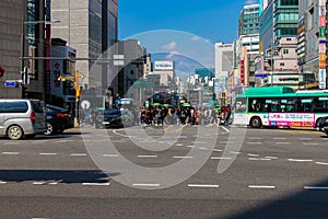 Seoul, South Korea - October 19, 2019: People cross the road. Busy intersection in the Yeongdeungpo area.