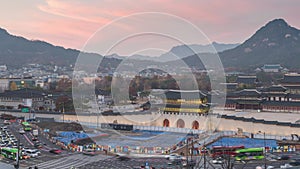 Seoul South Korea skyline day to night time lapse at Gyeongbokgung Palace in autumn