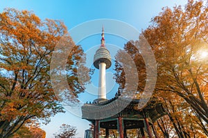 Seoul Tower with yellow and red autumn maple leaves at Namsan mountain in South Korea