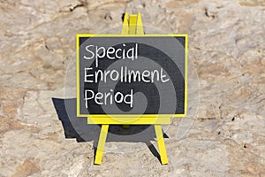 SEP special enrollment period symbol. Concept words SEP special enrollment period on black chalk blackboard on a beautiful stone