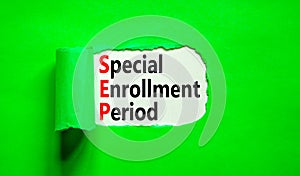 SEP symbol. Concept words SEP Special enrollment period on beautiful white paper. Beautiful green table green background. Medical