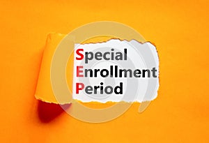 SEP symbol. Concept words SEP Special enrollment period on beautiful white paper. Beautiful orange table orange background.