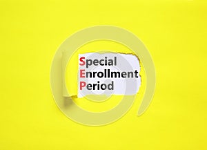 SEP symbol. Concept words SEP Special enrollment period on beautiful white paper. Beautiful yellow table yellow background.