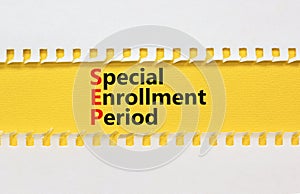SEP symbol. Concept words SEP Special enrollment period on beautiful yellow paper. Beautiful white table white background. Medical