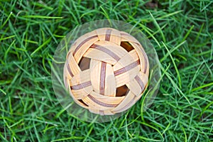 Sepak Takraw asia sport in court - rattan ball or takraw ball on green grass meadow