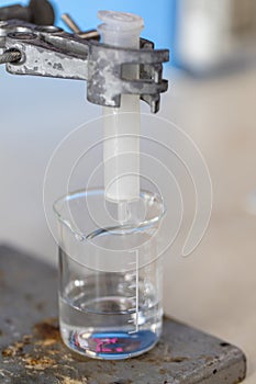 Separating by filtration and evaporation condensation the component substances from liquid mixture in Lab.