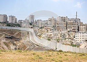 Separation barrier, here a high concrete wall, around the West