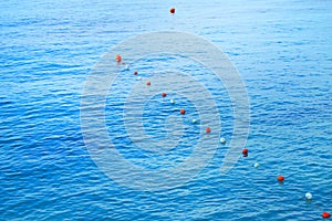 Separation buoys in the sea for safe swimming on the beach