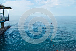 Separation buoys in the sea for safe swimming on the beach