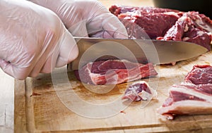 Separation of a raw mutton meat with rib