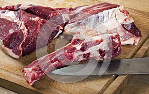 Separation of a raw mutton meat with rib