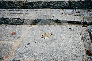 Sephardi Jewish symbol with the shape of the Iberian Peninsula of the former Jewish quarter within medieval city of photo