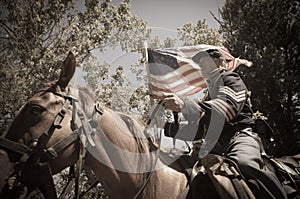 Sepia calvary soldier civil war reenactment