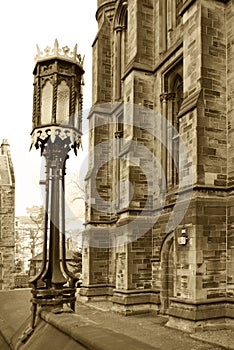 Sepia lamp and gothic building