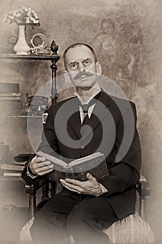 Sepia portrait of man reading the book