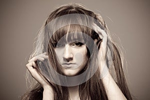 Sepia portrait of young beautiful woman