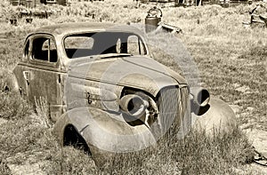 Sepia Toned Antique Automobile in the Desert Landscape