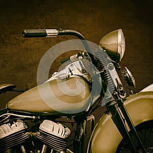 Sepia toned image of a fourties vintage motorcycle photo