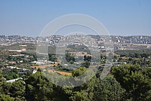 Landscape of trees and city from Sepphoris Zippori National Park in Central Galilee Israel