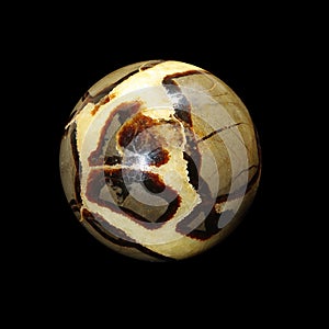 Septaria calcite ball on black background