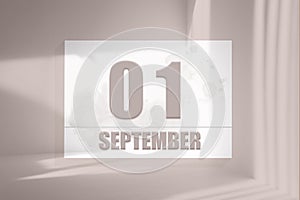 september 01. 01th day of the month, calendar date.White sheet of paper with numbers on minimalistic pink background