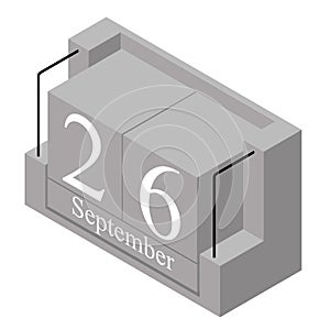 September 26th date on a single day calendar. Gray wood block calendar present date 26 and month September isolated on white